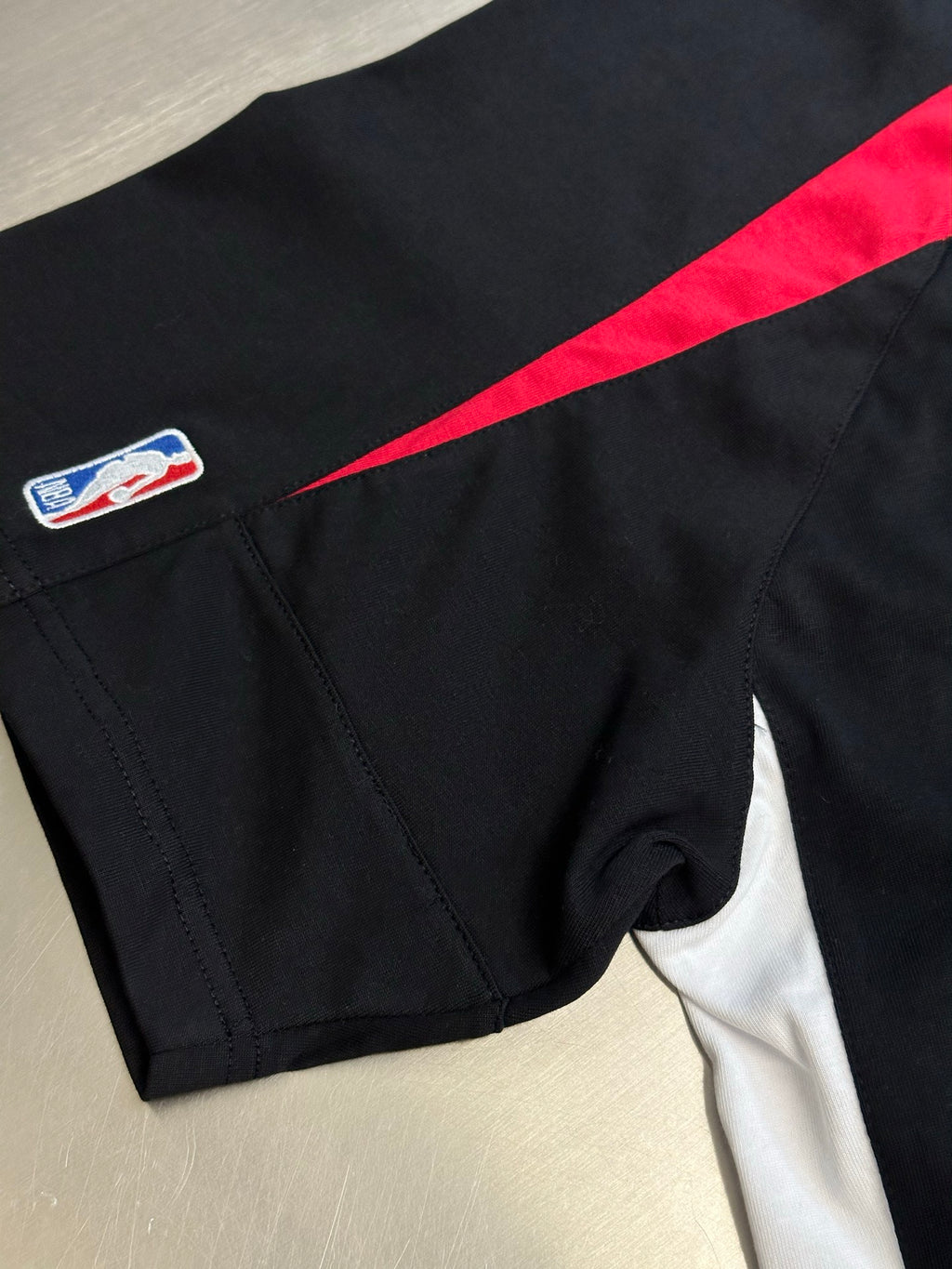 Balenciaga black jersey short sleeve with red shoulder stripe and small side patch