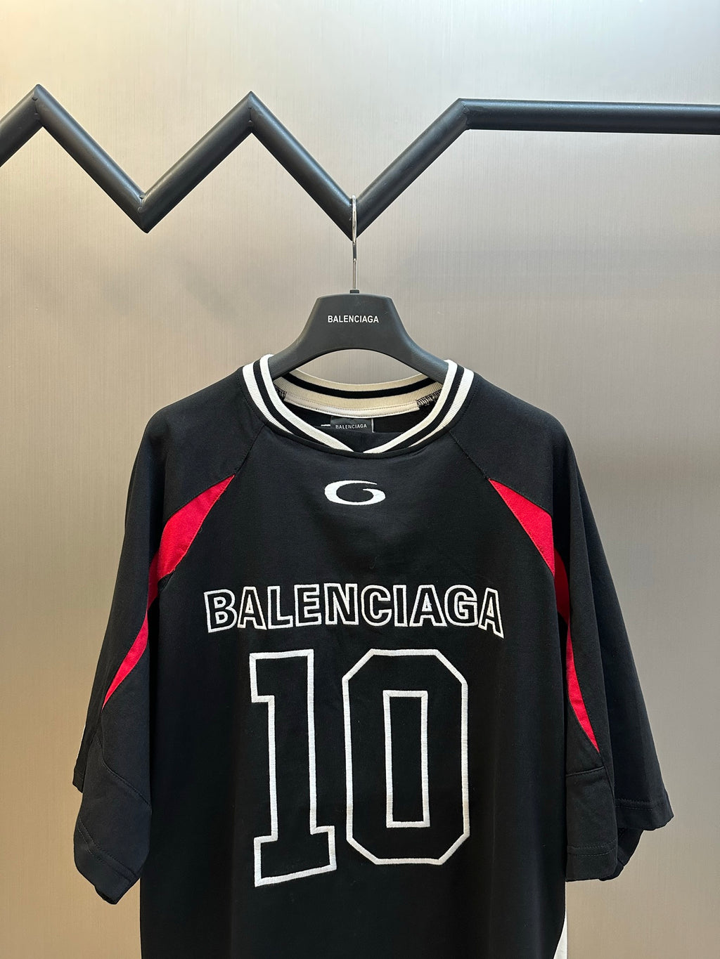 Balenciaga black jersey short sleeve shirt with BALENCIAGA 110 front print and red side panels