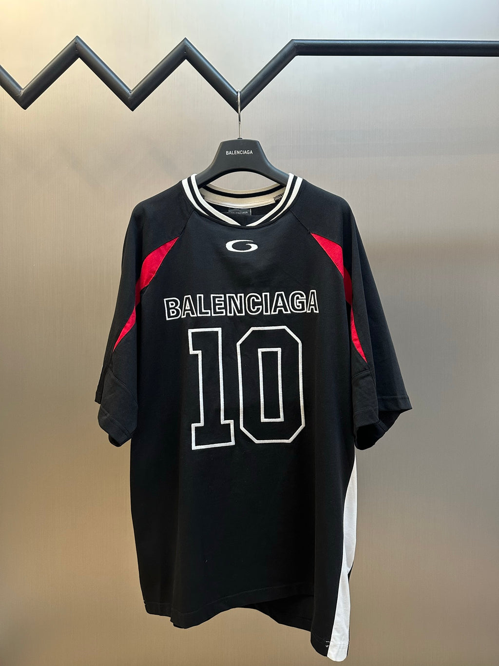 Balenciaga black jersey short sleeve shirt with BALENCIAGA 110 front print and red accents