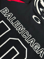 Balenciaga black jersey with BALENCIAGA white outlined text and 10-style number graphic