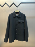Burberry long-sleeve coat with dark button-front and pointed collar