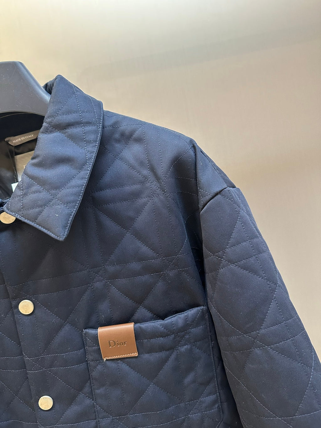 Quilted long jacket shoulder and chest area with Dior patch and front buttons