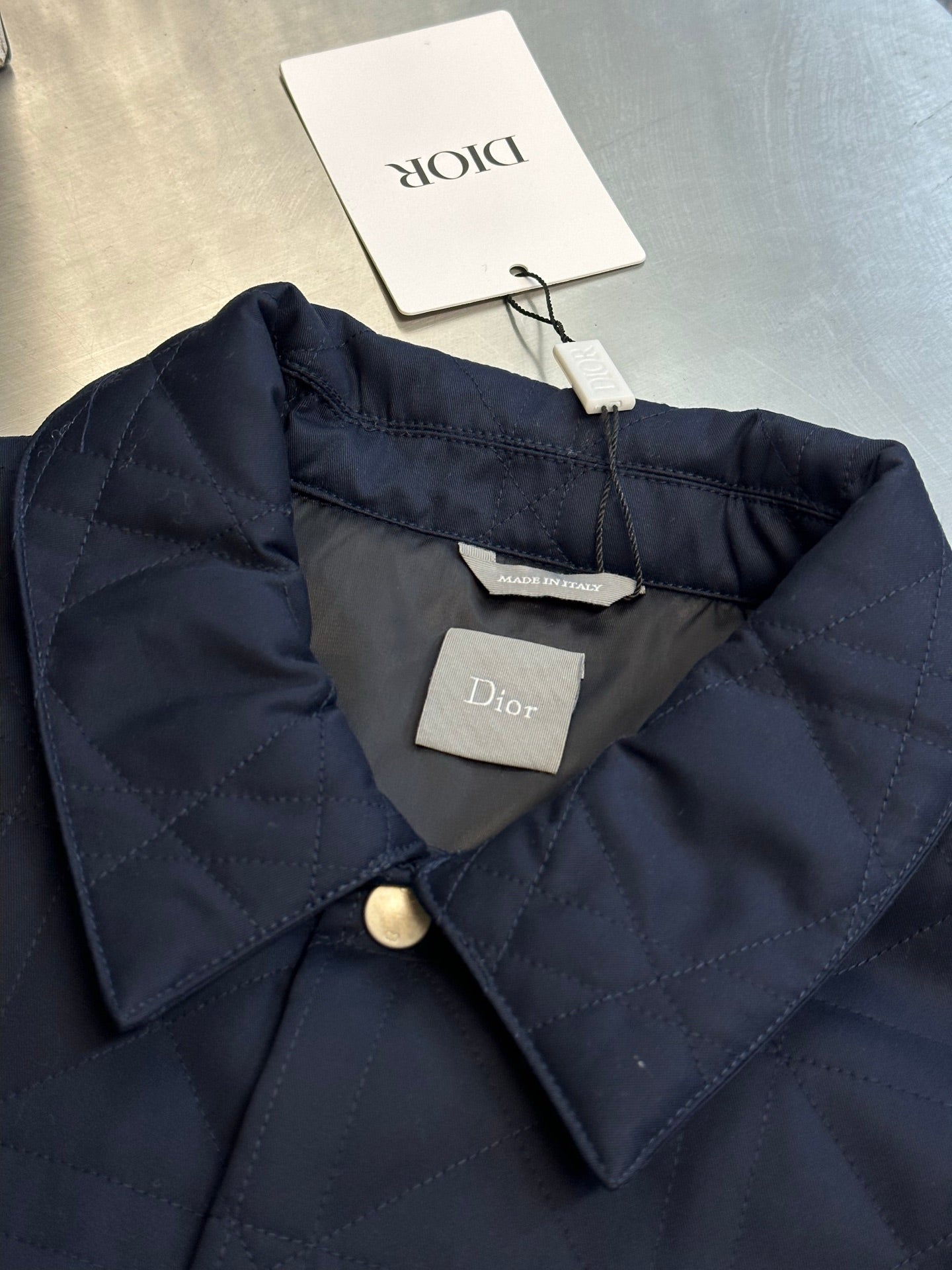 Quilted long jacket neckline and lining with Dior label and care tag