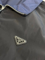 Prada long jacket chest logo patch and metal zipper trim