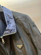 Prada long jacket sleeve with zipper pull and chest logo patch