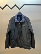 Prada long jacket with hood, front zipper, and chest logo patch
