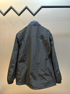 Prada long jacket, back view with hood and gathered hem