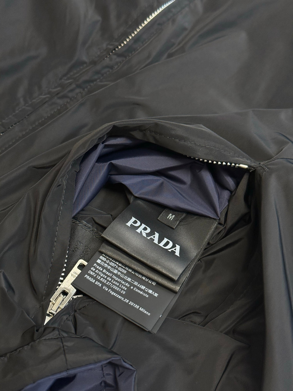 Prada long jacket inner label and stitched pocket with fabric lining