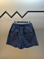Prada navy shorts with elastic waist and two flap cargo pockets