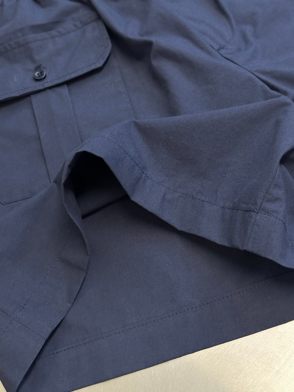 Prada navy shorts with flap pocket and interior opening