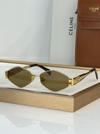Celine sunglasses with gold-tone frame and dark brown gradient lenses, black arms