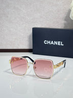 Chanel square sunglasses with pink lenses, gold-tone frame and temple details
