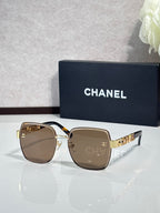 Chanel square sunglasses with taupe lenses, gold-tone frame, patterned temple arms