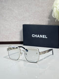Chanel rectangular eyeglasses with clear lenses, silver frame, gold temple lettering