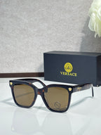 Versace sunglasses with dark brown square frames and smoky lenses, gold emblem on temple