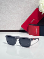 Prada square sunglasses with dark lenses and gray temples, front view