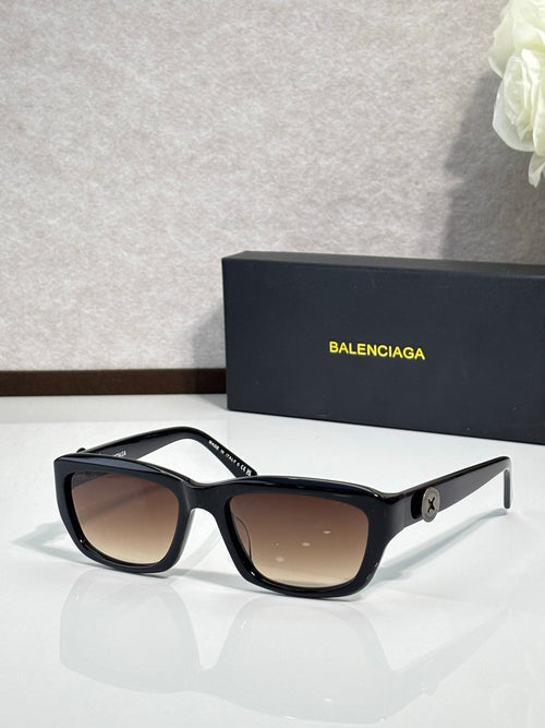 Balenciaga sunglasses with black frame and brown-tinted lenses