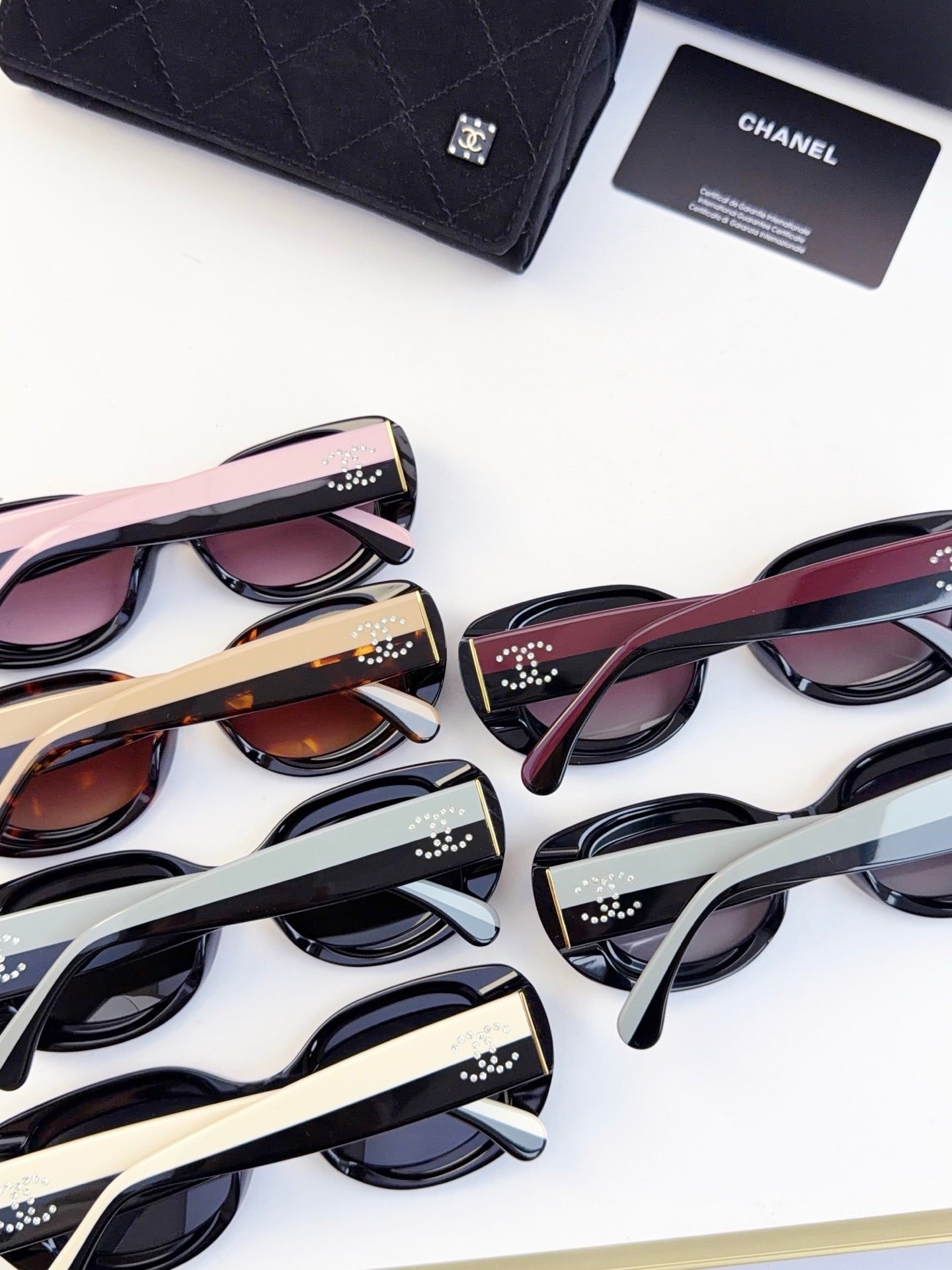 CHANEL sunglasses assortment with multiple frames and tinted lenses