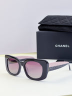 Chanel sunglasses with dark blue frames and pink tinted lenses