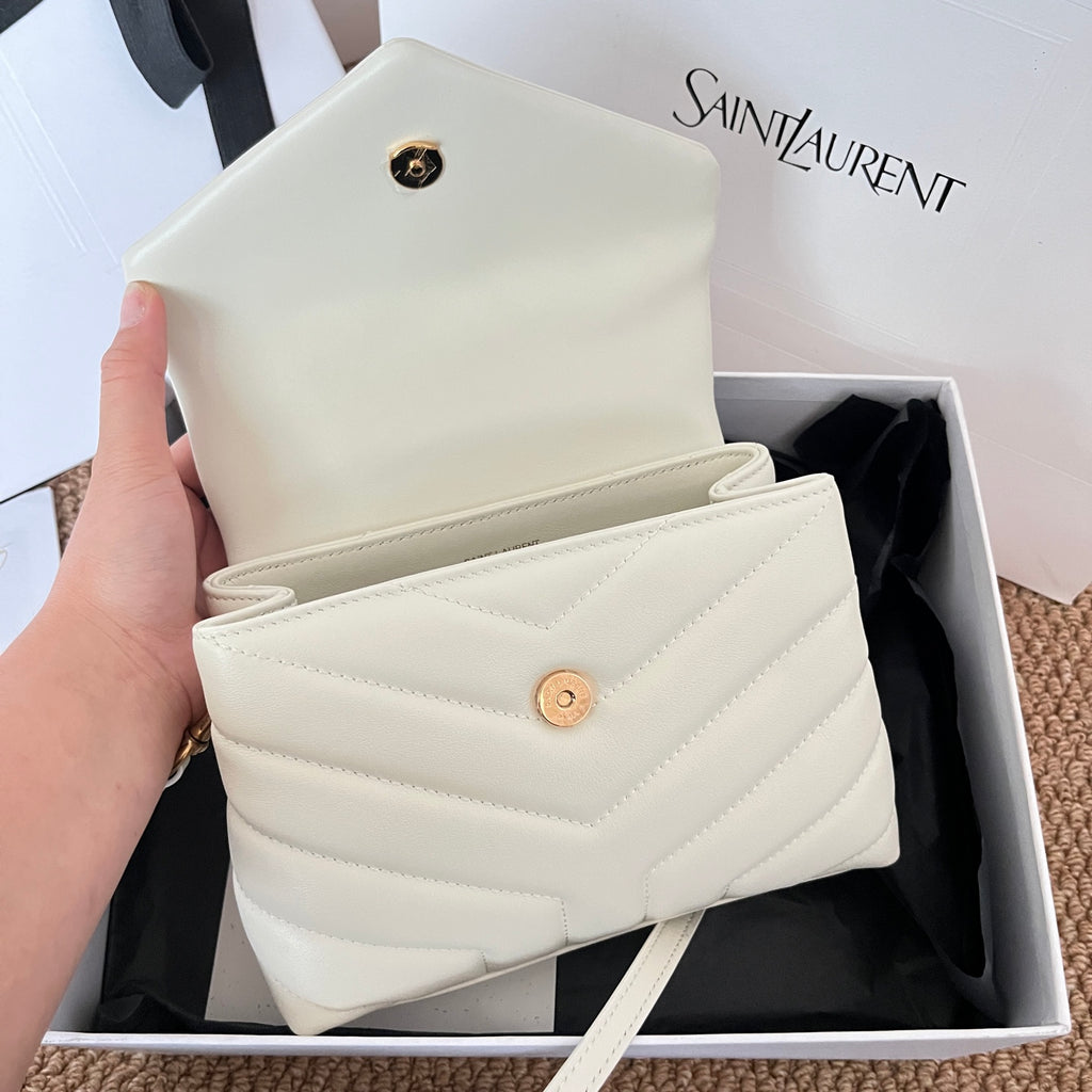 Saint Laurent small quilted crossbody bag, light cream leather with snap closure