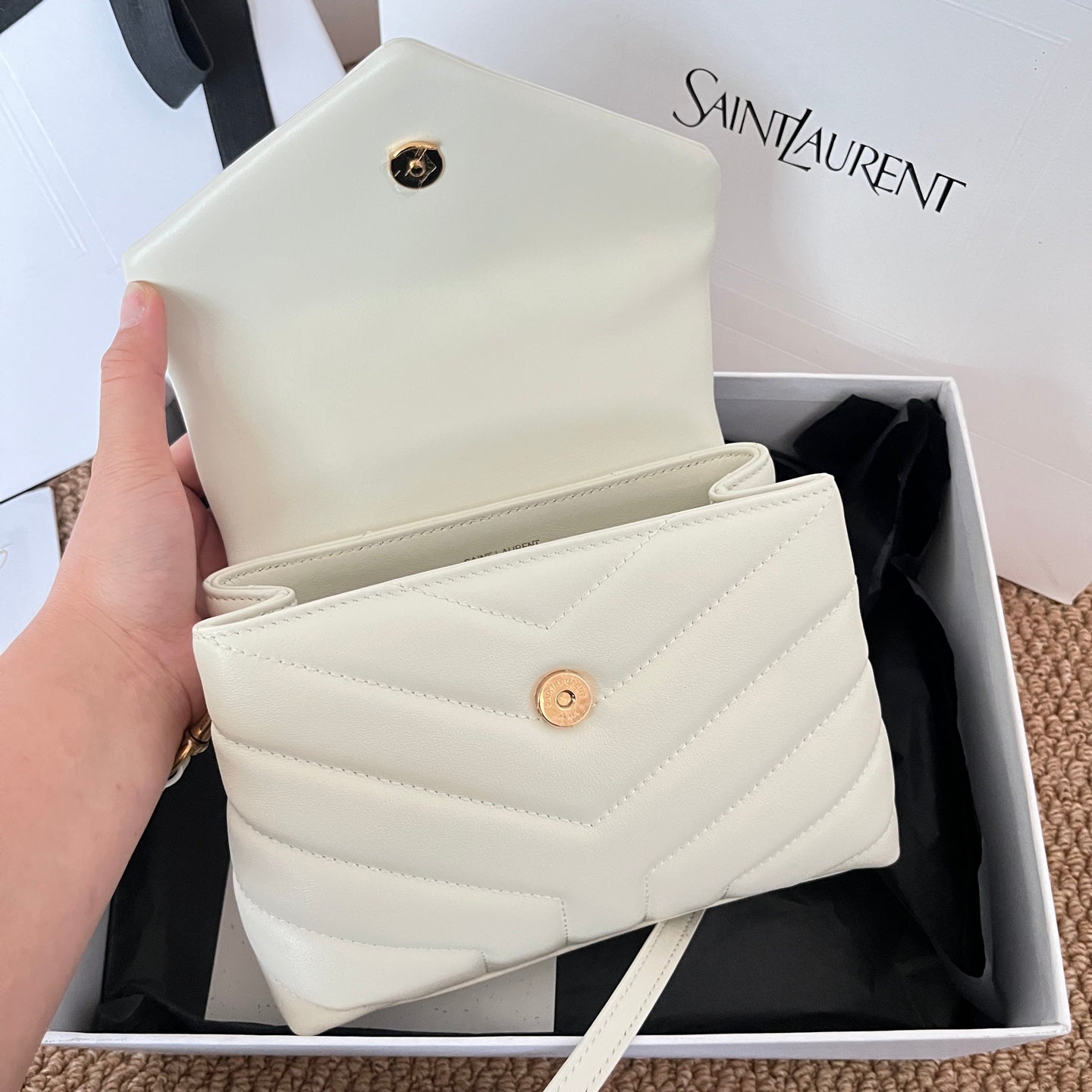 Saint Laurent small quilted crossbody bag, light cream leather with snap closure