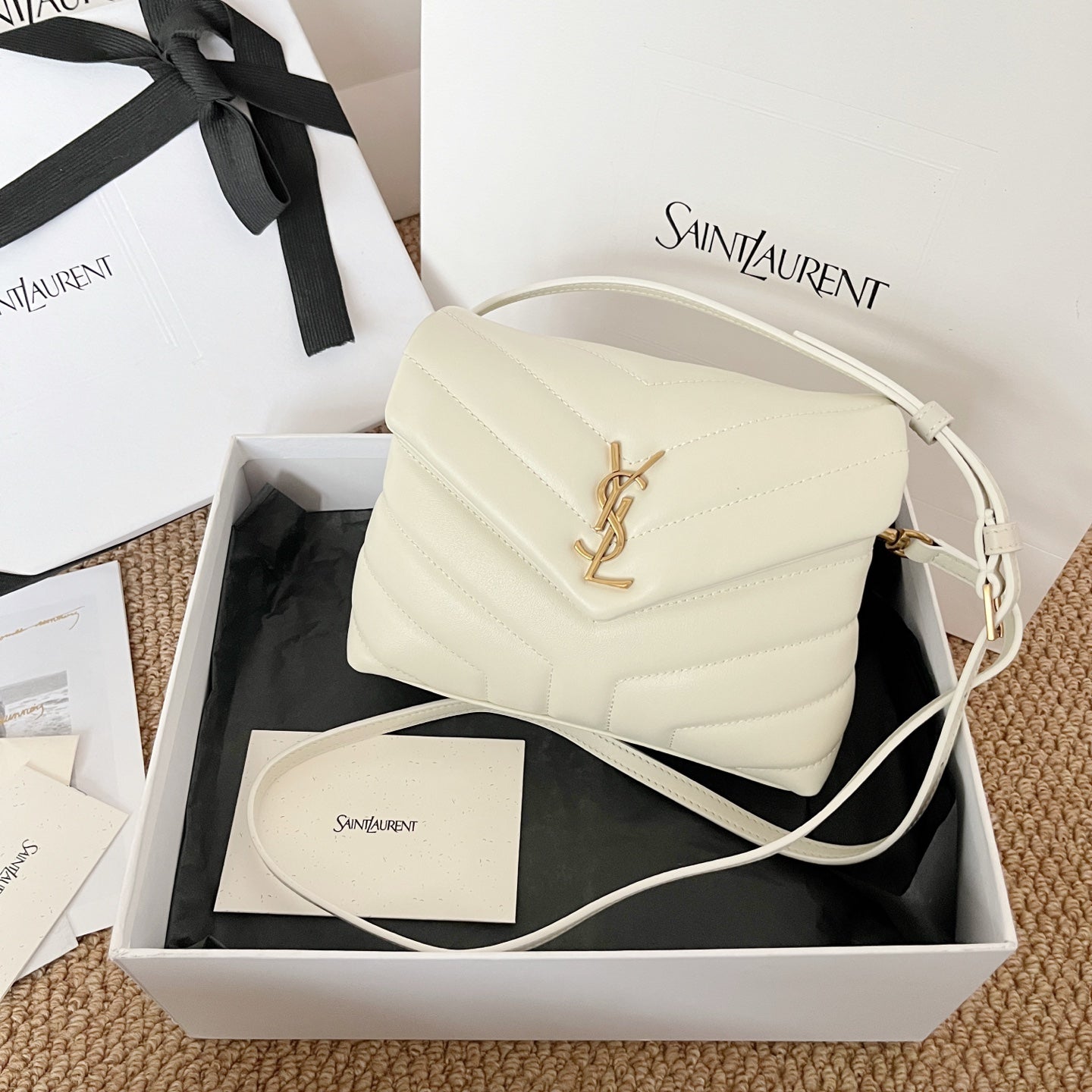 Saint Laurent quilted shoulder bag with YSL logo, light cream, gold-tone hardware