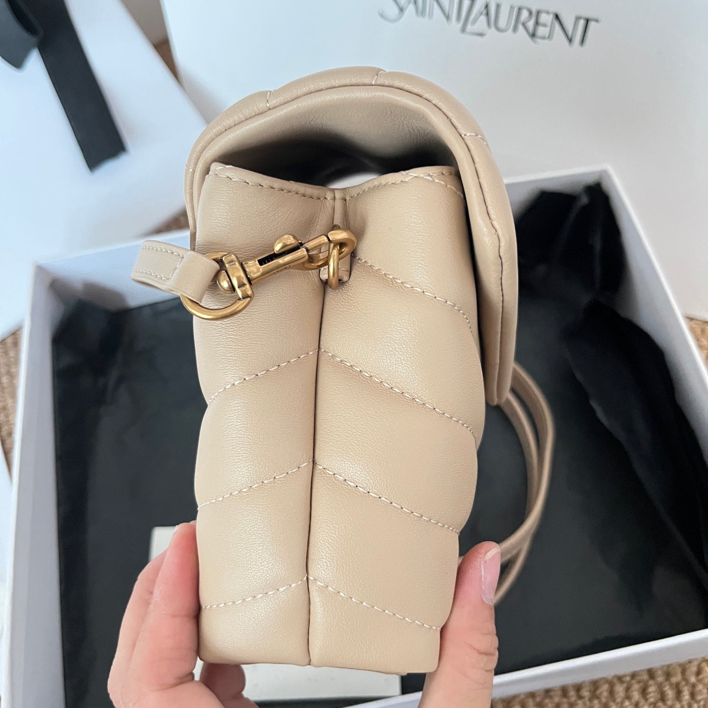 Beige YSL mini shoulder bag with front clasp and adjustable strap