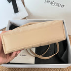 Beige YSL shoulder bag back panel with flap and crossbody strap