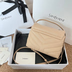 Beige quilted YSL shoulder bag with flap, front logo, and crossbody strap