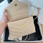 Beige YSL mini shoulder bag with front snap and crossbody strap in box