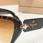 Bvlgari cat-eye sunglasses close-up with tortoiseshell arms and gold emblem