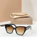 Bvlgari cat-eye sunglasses with tortoiseshell frames and amber lenses