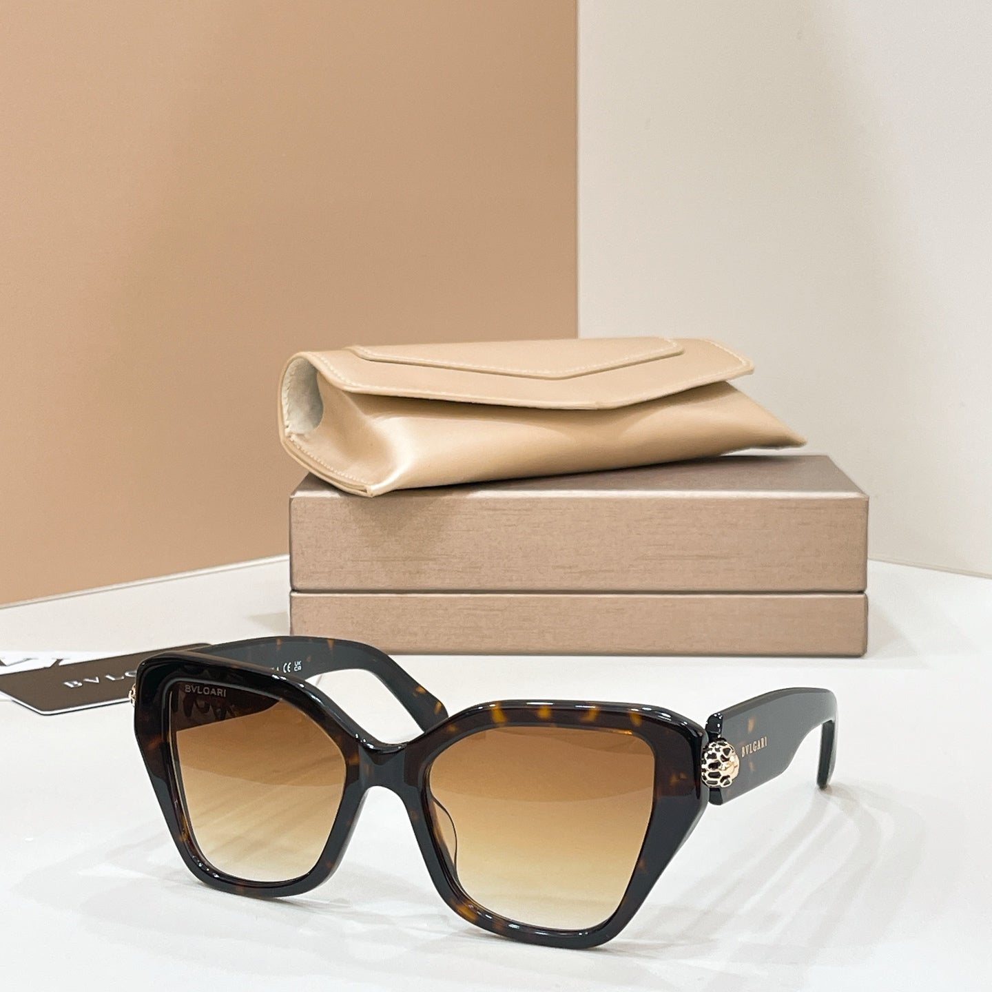 Bvlgari cat-eye sunglasses with tortoiseshell frames and amber lenses