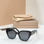 Bvlgari cat-eye sunglasses with black frames and dark gray lenses