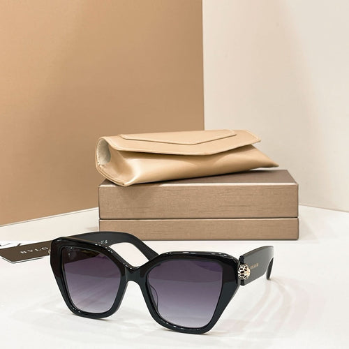Bvlgari cat-eye sunglasses with black frames and dark purple lenses