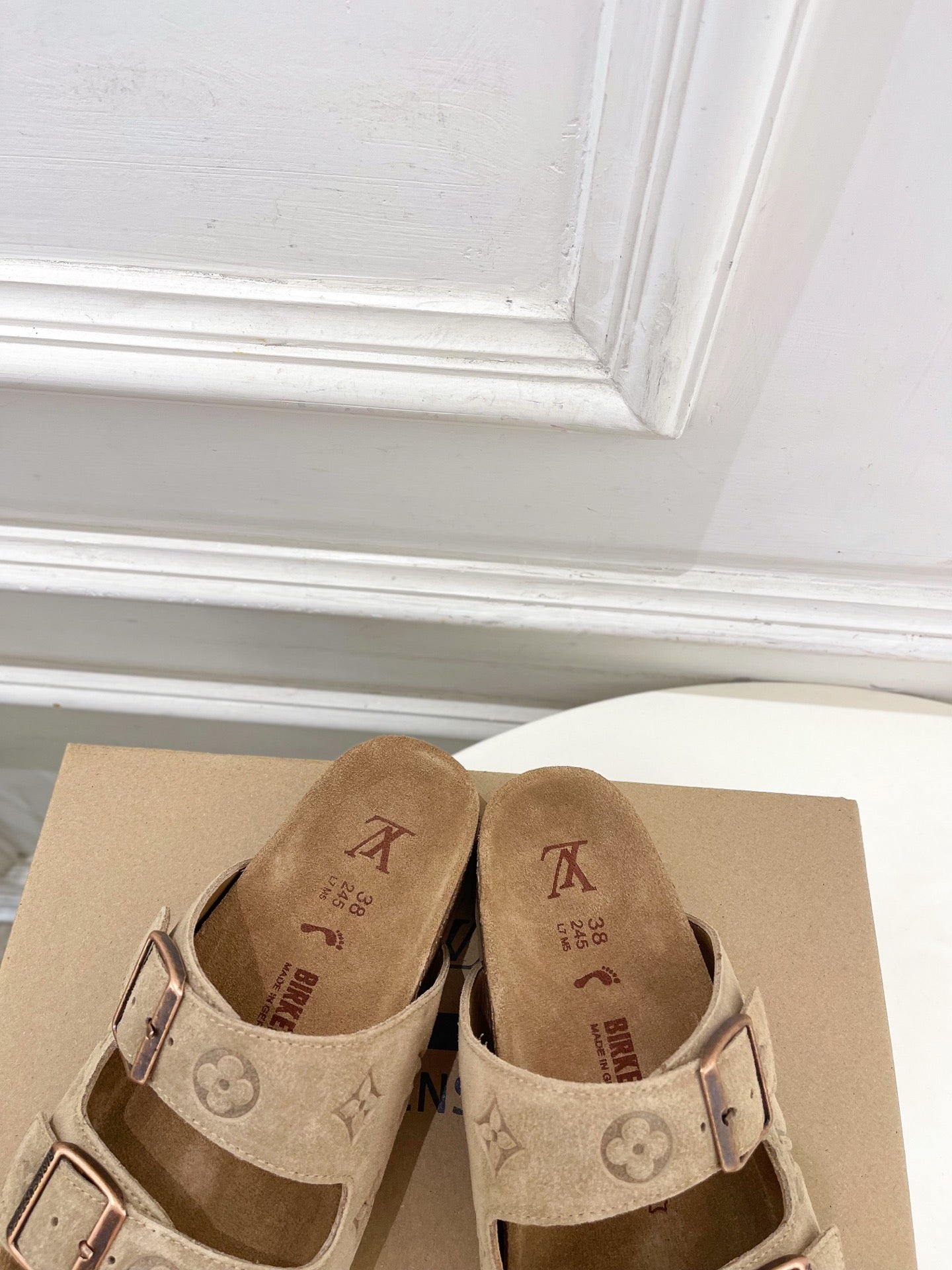 Louis Vuitton slide sandals, tan monogram straps with square buckle hardware