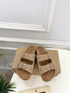 Louis Vuitton two-strap slide sandals, tan monogram canvas with buckled straps