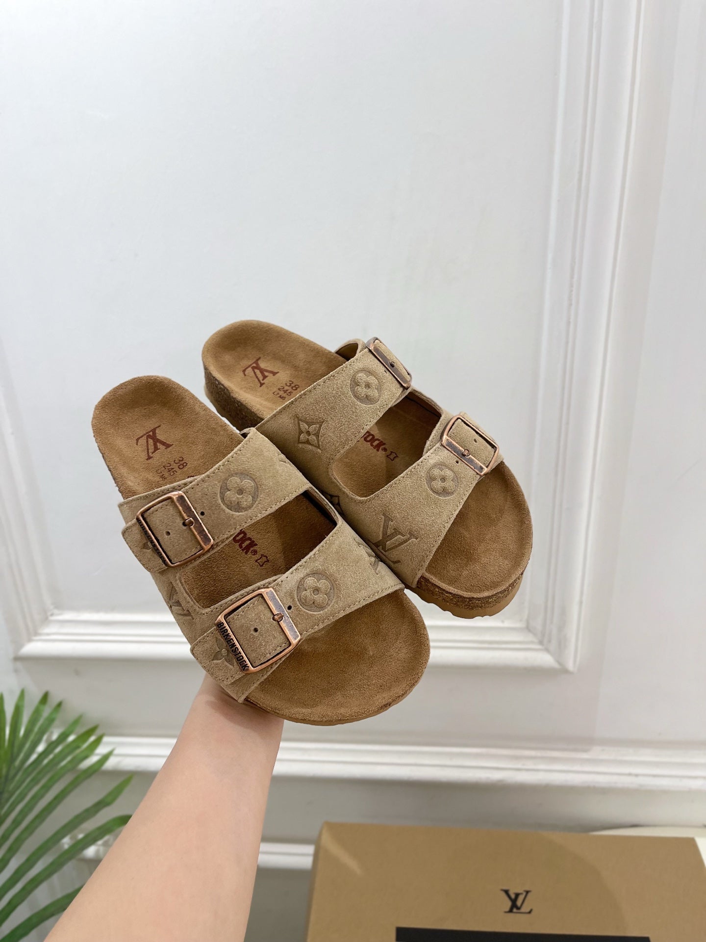 Louis Vuitton two-strap slide sandals, tan monogram canvas, double buckles