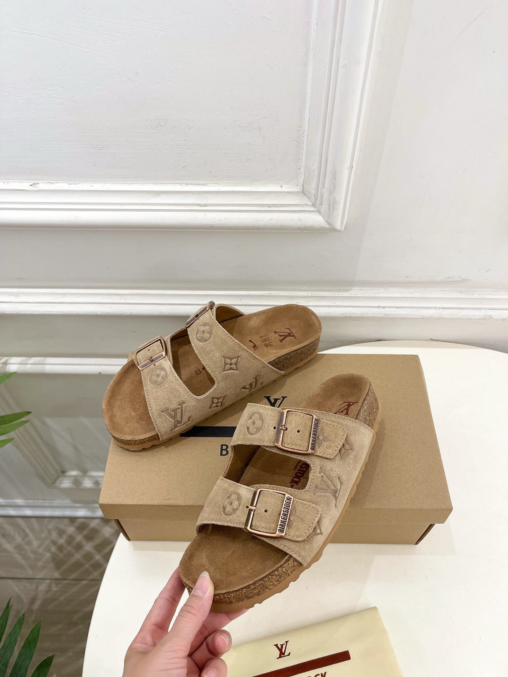 Louis Vuitton two-strap slide sandals, tan monogram canvas, silver-tone buckles