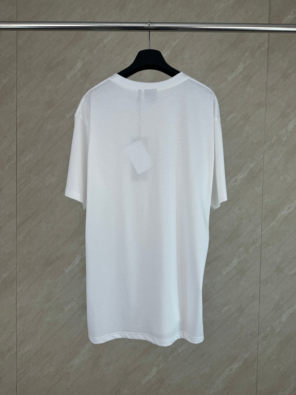 White Dior short-sleeve T-shirt with crew neck, back view.