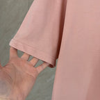 Pink short-sleeve T-shirt with stitched sleeve hem