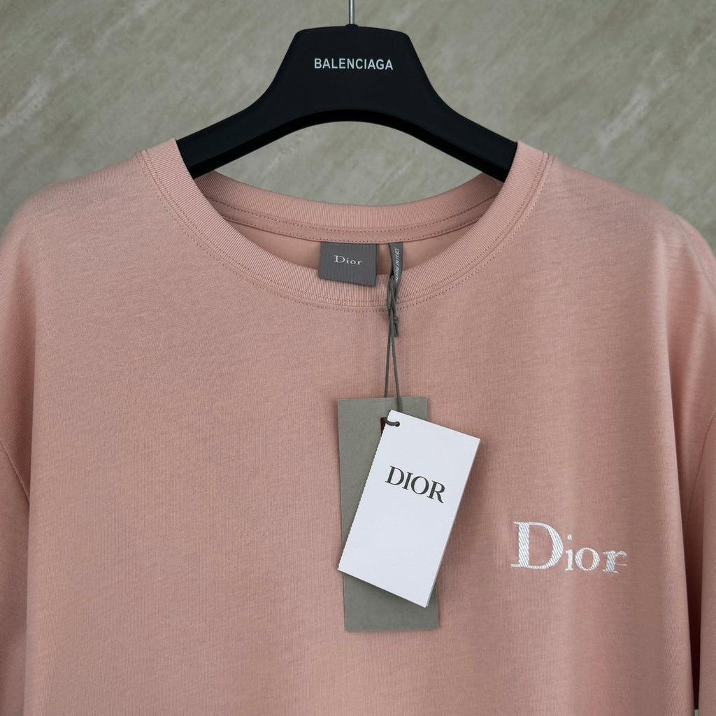 Pink short-sleeve T-shirt with Dior logo and hanging brand tag