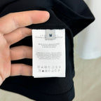 Moncler polo shirt inner neck tag with size and care information