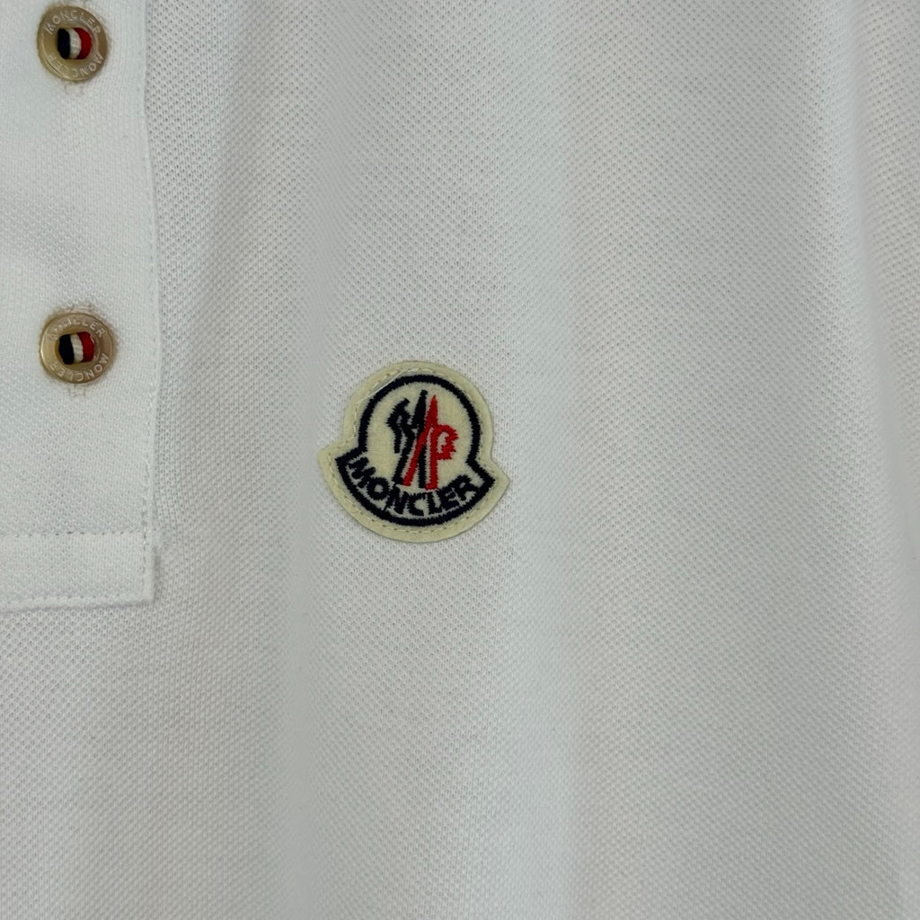 White polo shirt chest patch with crest emblem