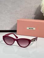 MiuMiu sunglasses with burgundy frames and purple tinted lenses