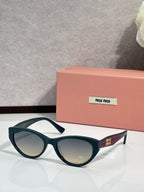 MiuMiu sunglasses with dark green frames and light tinted lenses