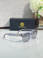 Versace sunglasses with clear blue frames and clear gray tinted lenses