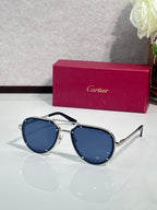 Cartier sunglasses with gold-and-navy frame and dark blue lenses, full-rim