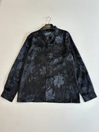 Gucci long-sleeve button-up shirt front view, dark navy with floral print
