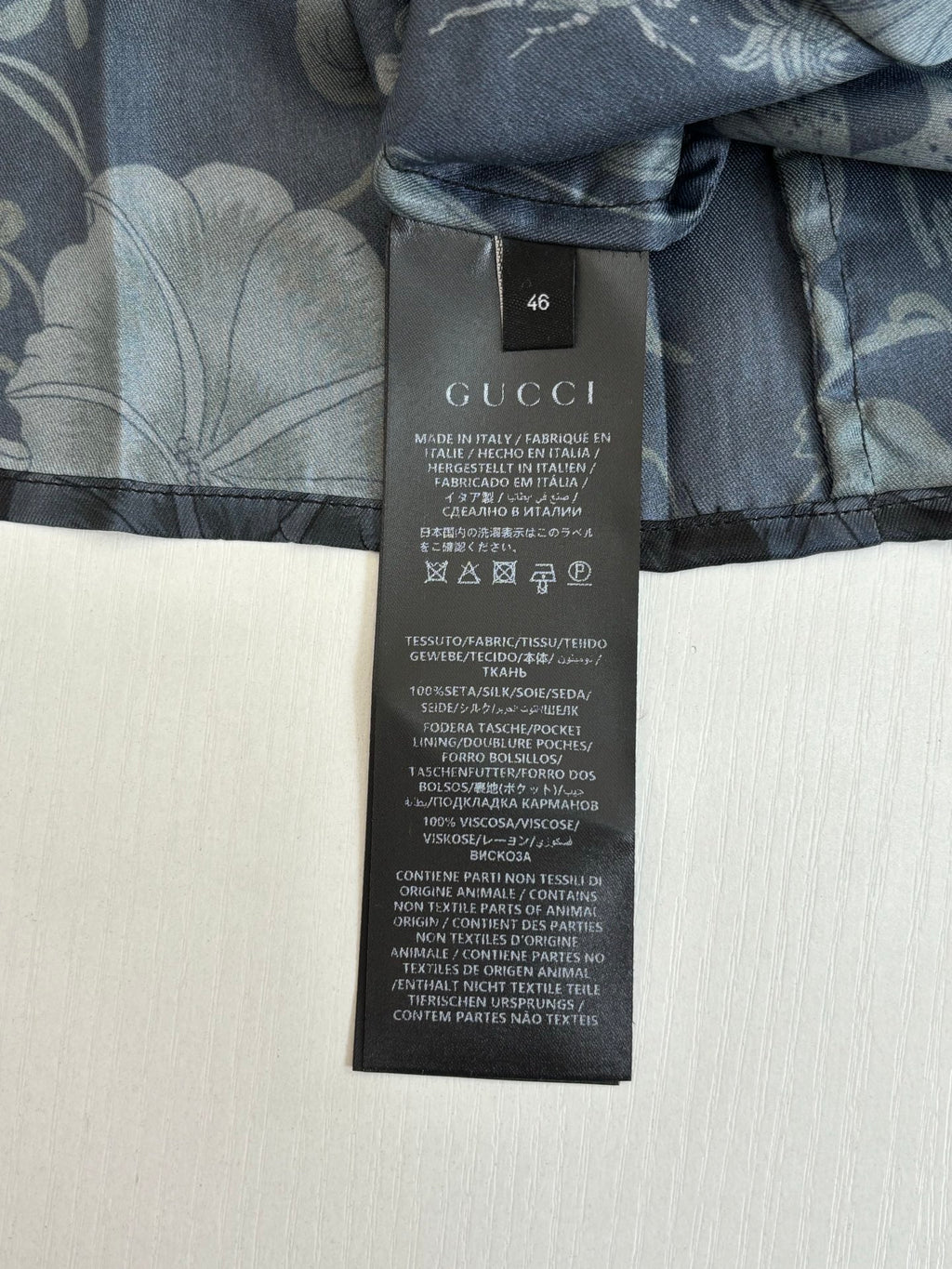 Gucci long-sleeve shirt size and care label tag at hem